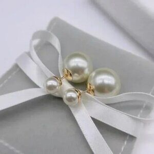 Double Pearl Earnings